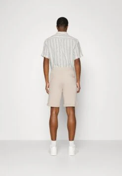 Pier One Trainingsbroek - Tan -Pier One 4aa2d35f8fdb4e739f8399ebd96345f5 scaled